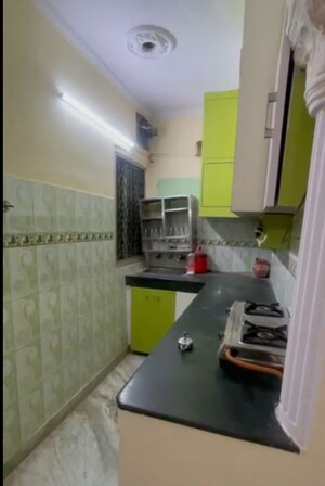 Kitchen in 1 BHK Builder Floor at Mansarover Garden – for Sale