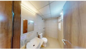 Bathroom in 2 BHK Apartment at Bhartiya Nikoo Homes, Thanisandra Main Road – for Sale