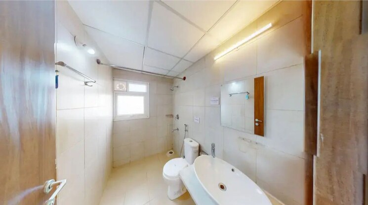 Bathroom, bhartiya-nikoo-homes 2 Bedroom 933 Sq.Ft. Apartment In Thanisandra Main Road Bangalore 9743908