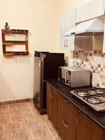Kitchen in 3.5 BHK Apartment at Ansal Celebrity Meadows, Sushant Golf City – for Rent