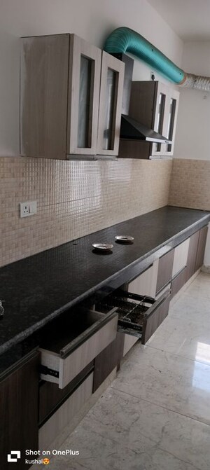 Kitchen in 2 BHK Apartment at Ansal Celebrity Meadows, Sushant Golf City – for Rent