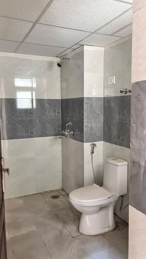 Bathroom in 2 BHK Apartment at Aims Greens Avenue, Sector 4 Greater Noida – for Rent