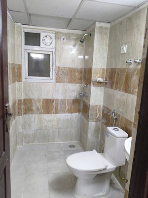 Bathroom in 2 BHK Apartment at Aims Greens Avenue, Sector 4 Greater Noida – for Rent