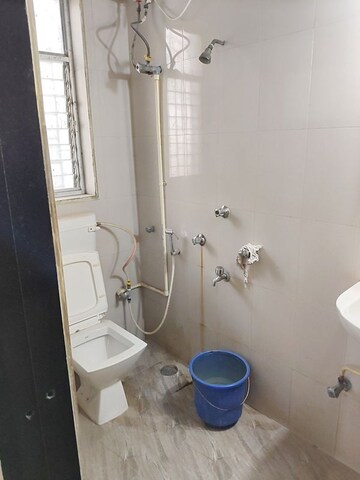 Bathroom in 2 BHK Apartment at Vile Parle East – for Rent