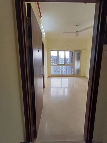 Building Lobby in 2 BHK Apartment at Omkar Signet, Malad East – for Rent