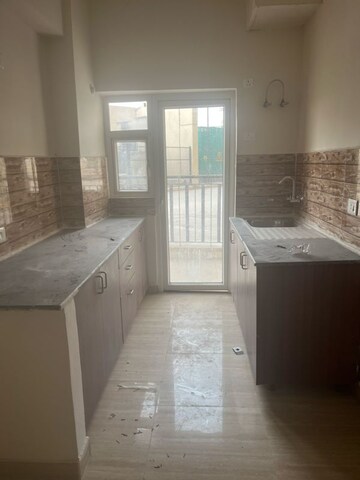 Kitchen in 3 BHK Apartment at Amrapali Centurian Park, Amrapali Dream Valley – for Rent