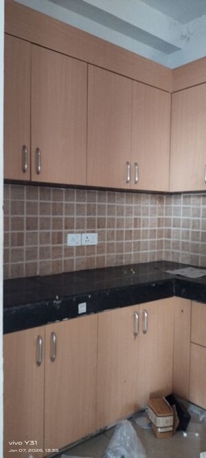 Kitchen in 2.5 BHK Apartment at Mahagun Mywoods, Sector 16c Greater Noida – for Rent