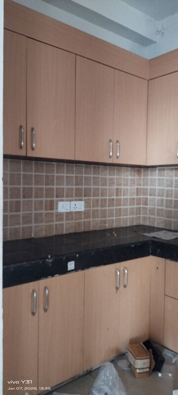 Kitchen in 2.5 BHK Apartment at Mahagun Mywoods, Sector 16c Greater Noida – for Rent