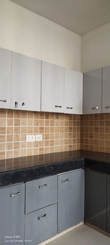 Kitchen in 3 BHK Apartment at Mahagun Mywoods, Sector 16c Greater Noida – for Rent