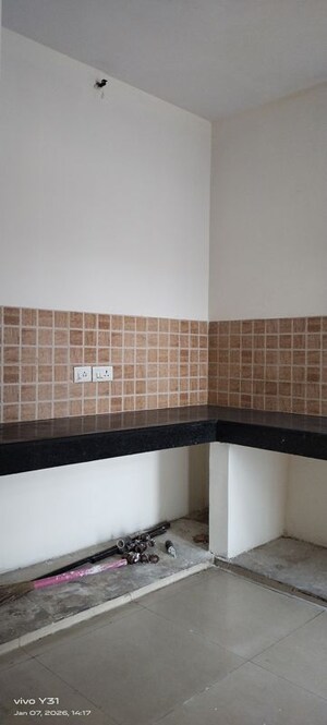 Kitchen in 3 BHK Apartment at Mahagun Mywoods, Sector 16c Greater Noida – for Rent