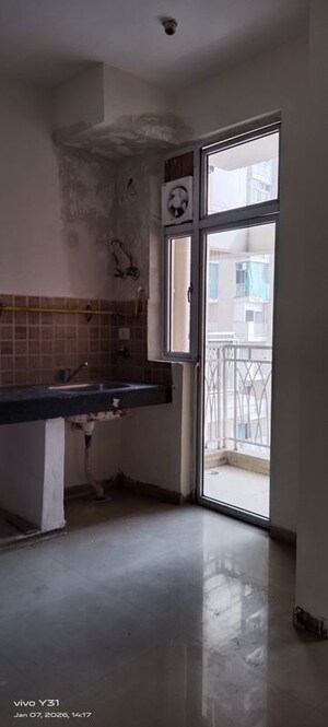 Kitchen in 3 BHK Apartment at Mahagun Mywoods, Sector 16c Greater Noida – for Rent