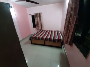Bedroom in 2 BHK Apartment at Sai Ganesh Vihar, Vadgaon Budruk – for Rent