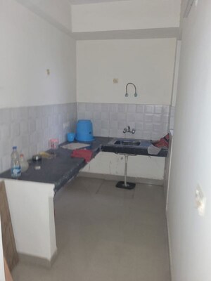 Kitchen in 2 BHK Apartment at Mahagun Mahagunpuram, Shastri Nagar – for Sale