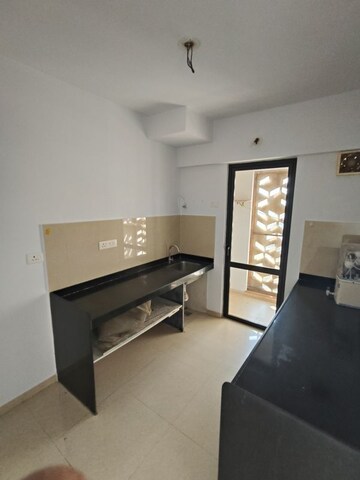 Living Room in 2 BHK Apartment at Lodha Lakeshore Greens, Dombivli East – for Rent