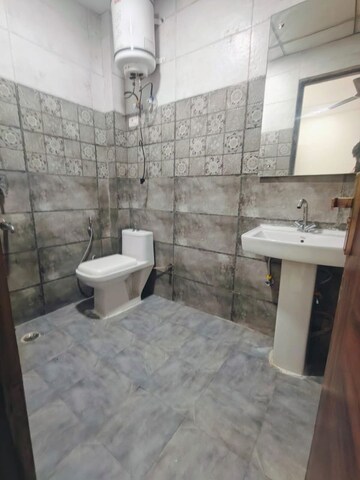 Bathroom in Studio Builder Floor at Vipul Square, Sushant Lok I – for Rent