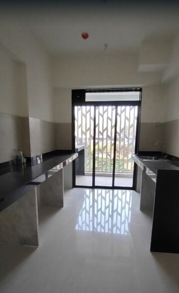 Living Room in 2 BHK Apartment at Lodha Woods, Kandivali East – for Rent