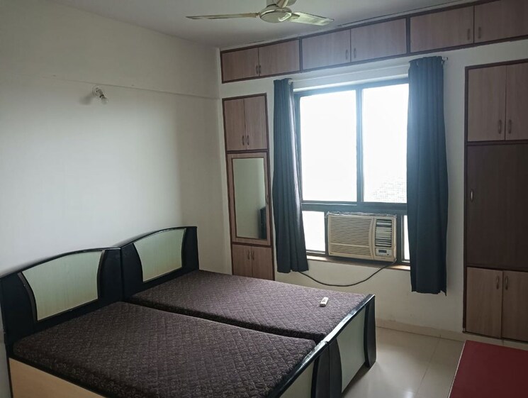 Bedroom, lunkad-amazon 2 Bedroom 850 Sq.Ft. Apartment In Viman Nagar Pune 9746541