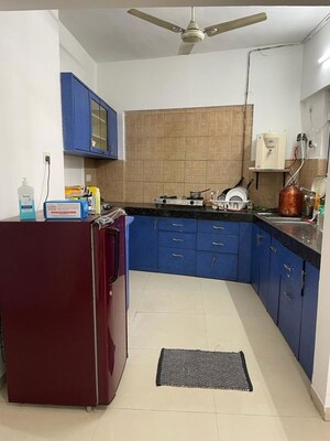 Kitchen in 3 BHK Apartment at Gera Emerald City, Kharadi – for Sale