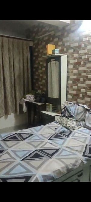 Living Room in 1 BHK Apartment at Shree Murti CHS, Kalyan West – for Sale