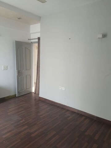 Bedroom in 3 BHK Apartment at Prateek Wisteria, Sector 77 – for Rent