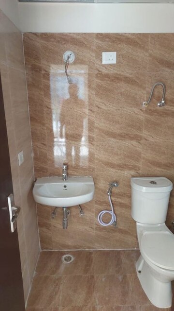 Bathroom in 3 BHK Apartment at Amrapali Crystal Homes, Sector 76 – for Rent