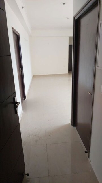 Building Lobby in 3 BHK Apartment at Amrapali Crystal Homes, Sector 76 – for Rent