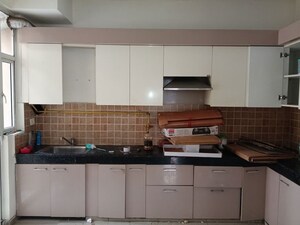 Kitchen in 3 BHK Apartment at Mahagun Mywoods II, Sector 16c Greater Noida – for Rent