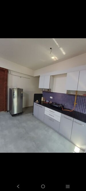 Kitchen in 1 BHK Apartment at Siddhi Aarohi Elysium, South Bopal – for Rent