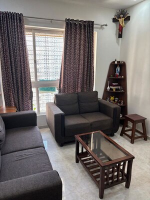 Living Room in 2 BHK Apartment at Lodha Amara, Kolshet Road – for Rent