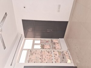 Kitchen in 2 BHK Apartment at Uninav Heights Phase II, Raj Nagar Extension – for Rent