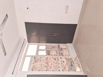 Kitchen in 2 BHK Apartment at Uninav Heights Phase II, Raj Nagar Extension – for Rent