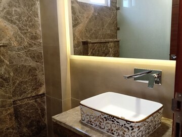 Bathroom in 4 BHK Apartment at Vasant Vihar – for Rent