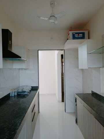 Kitchen in 1 BHK Apartment at Aaditya Jainam Heights, Nalasopara West – for Sale
