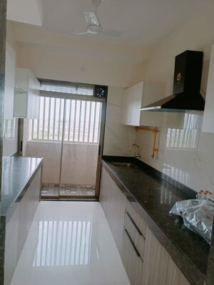 Kitchen in 1 BHK Apartment at Aaditya Jainam Heights, Nalasopara West – for Sale