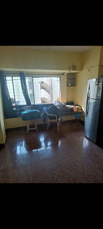 Living Room in 1 RK Apartment at Akshardham CHS, Malad West – for Rent