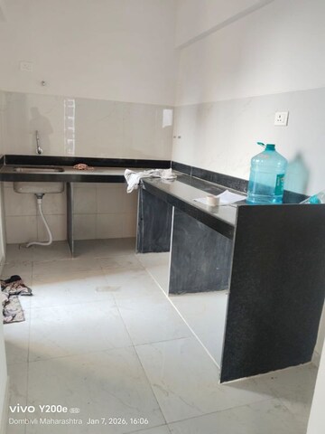 Kitchen in 2 BHK Apartment at Runwal Gardens, Dombivli East – for Rent