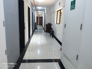 Building Lobby in 1.5 BHK Apartment at Runwal Gardens, Dombivli East – for Sale