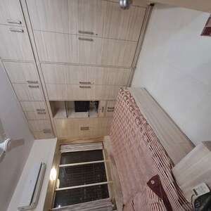 Master Bedroom in 1 BHK Apartment at Kingston Classic, Malad West – for Sale