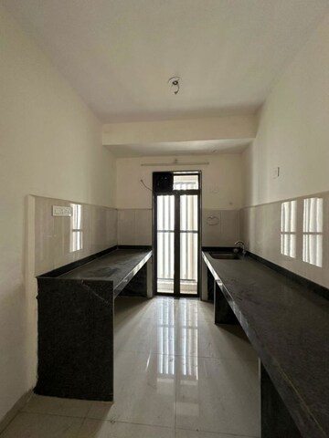 Building Lobby in 2 BHK Apartment at Runwal My City, Dombivli East – for Rent