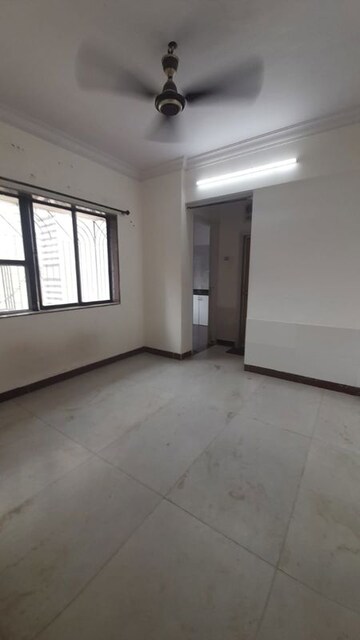 Room in 1 RK Apartment at Vasant Valley Complex, Malad East – for Rent
