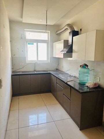 Kitchen in 3 BHK Builder Floor at Patiala Road – for Sale