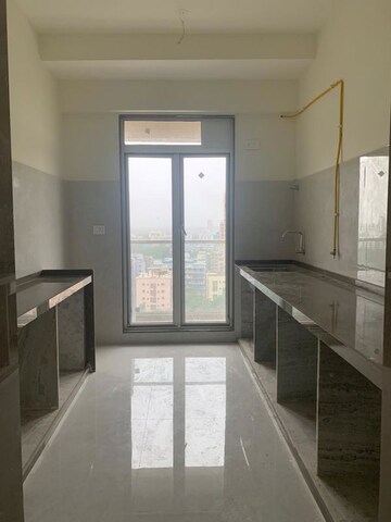 Kitchen in 2 BHK Apartment at Shraddha Elite, Borivali West – for Rent