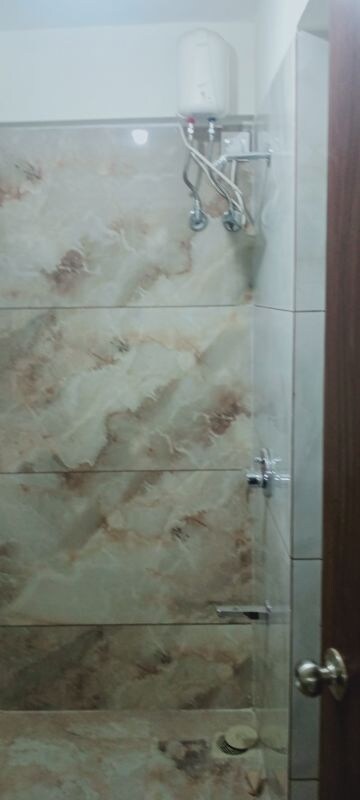 Bathroom in 1 BHK Apartment at Bindra Complex, Andheri East – for Rent