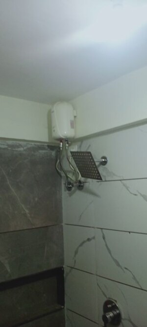 Bathroom in 1 BHK Apartment at Bindra Complex, Andheri East – for Rent