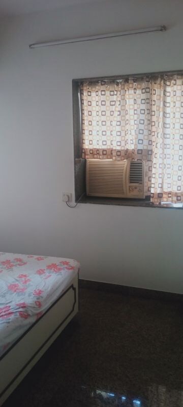Bedroom in 2 BHK Apartment at Takshila CHS, Andheri East – for Rent