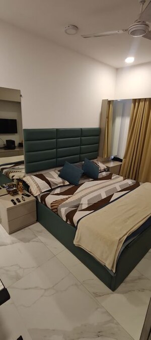 Bedroom in 2 BHK Apartment at Dev Leo Tower, Oshiwara – for Rent