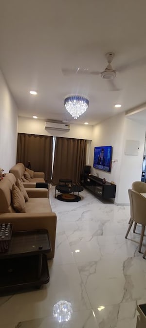 Living Room in 2 BHK Apartment at Dev Leo Tower, Oshiwara – for Rent