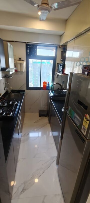 Team Area in 2 BHK Apartment at Dev Leo Tower, Oshiwara – for Rent