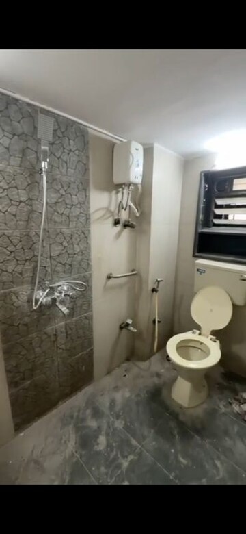 Bathroom in 2 BHK Apartment at Ahimsa Niketan CHS, Malad West – for Rent