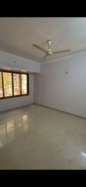 Bedroom in 2 BHK Apartment at Ahimsa Niketan CHS, Malad West – for Rent